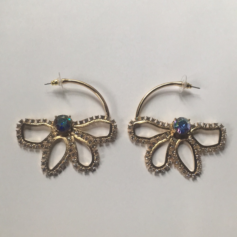 Beautiful and unique Free people flower hoops